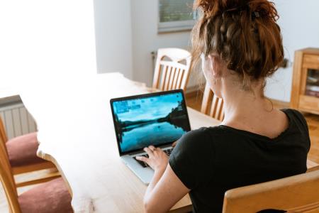 Young person at a laptop completing online work experience